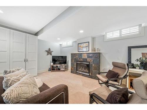 435 27 Avenue Ne, Calgary, AB - Indoor Photo Showing Other Room With Fireplace
