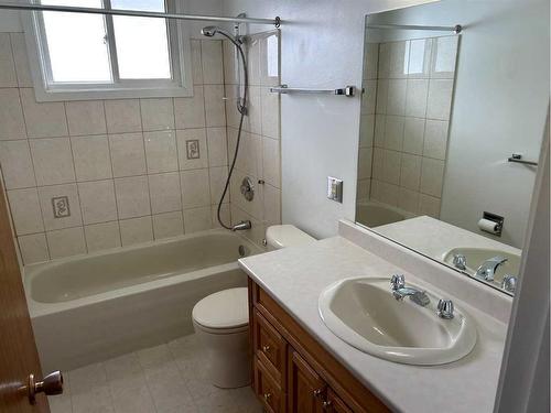 2201 22 Street, Nanton, AB - Indoor Photo Showing Bathroom