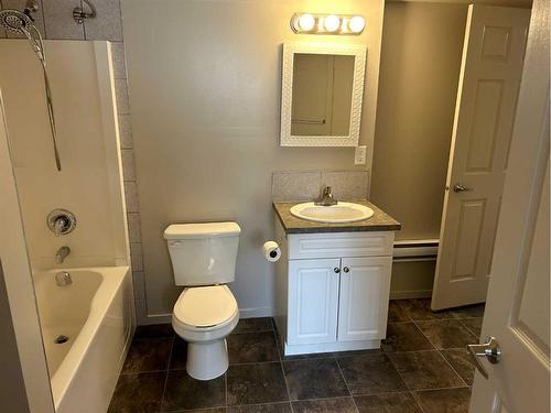 2201 22 Street, Nanton, AB - Indoor Photo Showing Bathroom