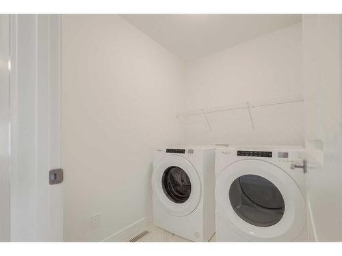36 Willow Green Sw, Airdrie, AB - Indoor Photo Showing Laundry Room