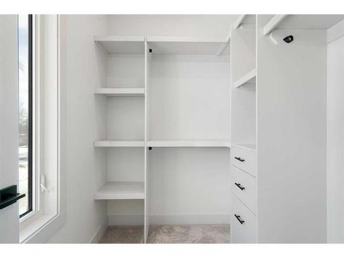 23 Rosscarrock Gate Sw, Calgary, AB - Indoor With Storage