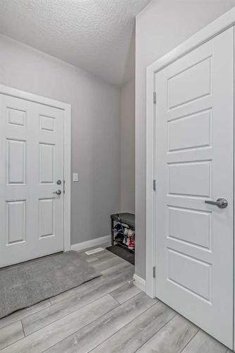 196 Dawson Harbour Heights, Chestermere, AB - Indoor Photo Showing Other Room