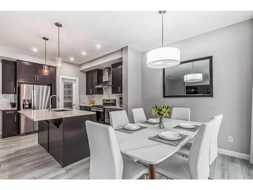 196 Dawson Harbour Heights, Chestermere, AB - Indoor Photo Showing Dining Room
