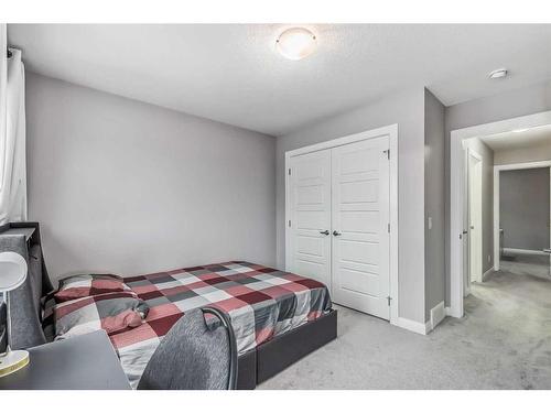 196 Dawson Harbour Heights, Chestermere, AB - Indoor Photo Showing Bedroom