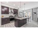 196 Dawson Harbour Heights, Chestermere, AB  - Indoor Photo Showing Kitchen With Upgraded Kitchen 
