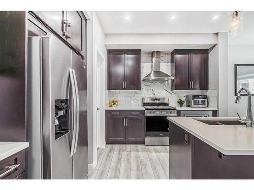 196 Dawson Harbour Heights, Chestermere, AB - Indoor Photo Showing Kitchen With Upgraded Kitchen