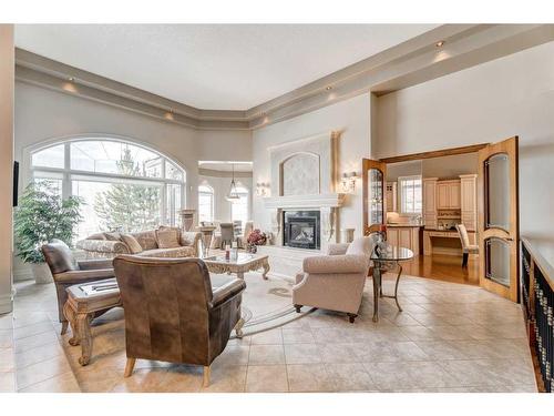 10 Slopeview Drive Sw, Calgary, AB - Indoor Photo Showing Living Room With Fireplace