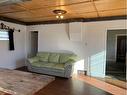 120 1 Avenue Sw, Diamond Valley, AB  - Indoor Photo Showing Living Room 