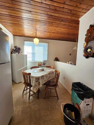 12 Huntley Close Ne, Calgary, AB - Indoor Photo Showing Dining Room