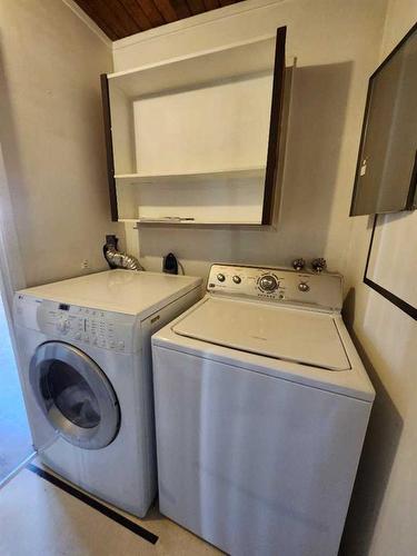 12 Huntley Close Ne, Calgary, AB - Indoor Photo Showing Laundry Room