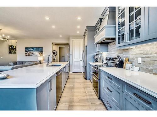 46 Cranbrook Cove Se, Calgary, AB - Indoor Photo Showing Kitchen With Upgraded Kitchen
