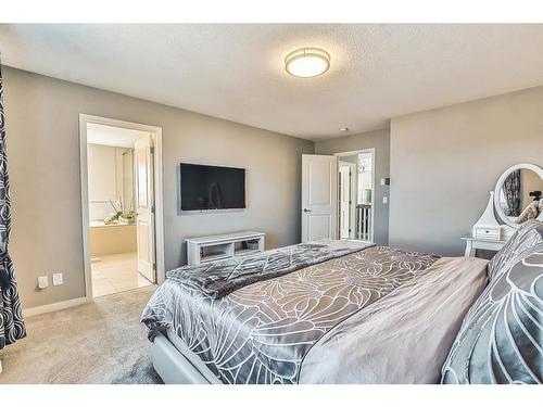 46 Cranbrook Cove Se, Calgary, AB - Indoor Photo Showing Bedroom
