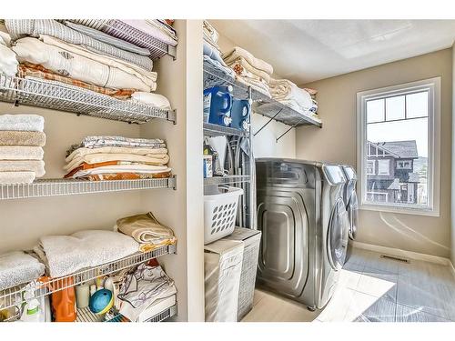 46 Cranbrook Cove Se, Calgary, AB - Indoor Photo Showing Laundry Room