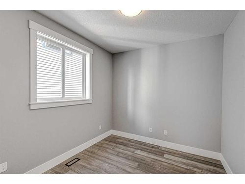 1213 Coopers Drive Sw, Airdrie, AB - Indoor Photo Showing Other Room