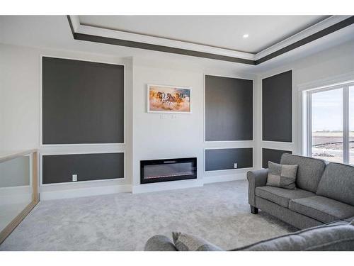 300 Watercrest Place, Chestermere, AB - Indoor Photo Showing Living Room With Fireplace