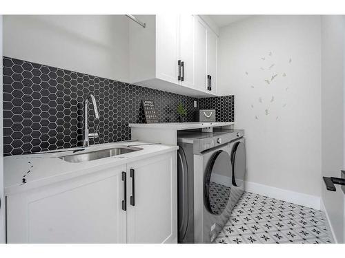 300 Watercrest Place, Chestermere, AB - Indoor Photo Showing Laundry Room