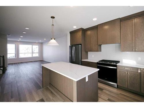 141 Treeline Avenue Sw, Calgary, AB - Indoor Photo Showing Kitchen With Stainless Steel Kitchen