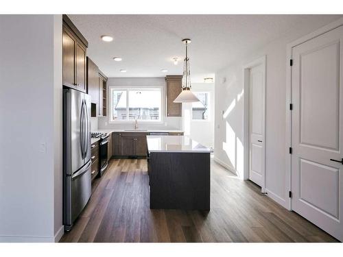 141 Treeline Avenue Sw, Calgary, AB - Indoor Photo Showing Kitchen With Stainless Steel Kitchen With Upgraded Kitchen