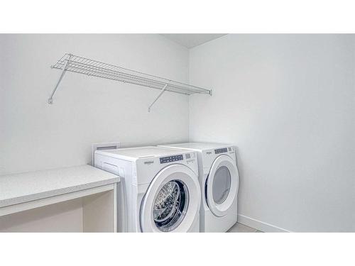 316 Calhoun Common Ne, Calgary, AB - Indoor Photo Showing Laundry Room