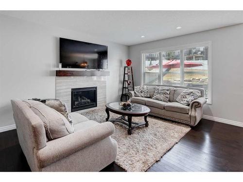 61 Nolanhurst Rise Nw, Calgary, AB - Indoor Photo Showing Living Room With Fireplace