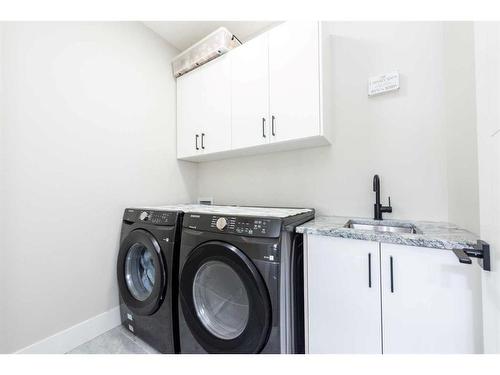 162 Kinniburgh Crescent, Chestermere, AB - Indoor Photo Showing Laundry Room
