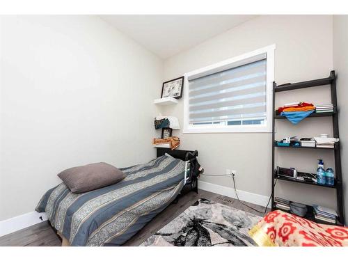 162 Kinniburgh Crescent, Chestermere, AB - Indoor Photo Showing Bedroom