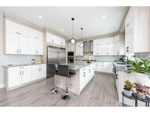 162 Kinniburgh Crescent, Chestermere, AB - Indoor Photo Showing Kitchen With Upgraded Kitchen