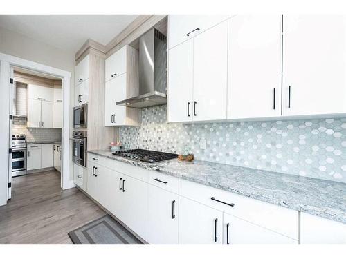 162 Kinniburgh Crescent, Chestermere, AB - Indoor Photo Showing Kitchen With Upgraded Kitchen
