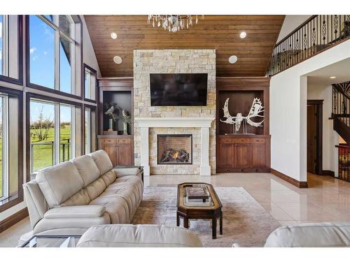 242036 96 Street East, Rural Foothills County, AB - Indoor Photo Showing Living Room With Fireplace