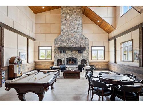 242036 96 Street East, Rural Foothills County, AB - Indoor Photo Showing Other Room With Fireplace