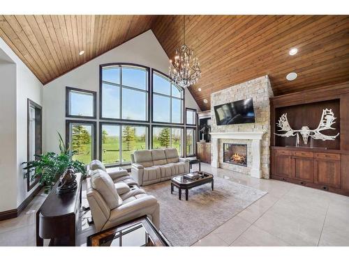 242036 96 Street East, Rural Foothills County, AB - Indoor Photo Showing Living Room With Fireplace