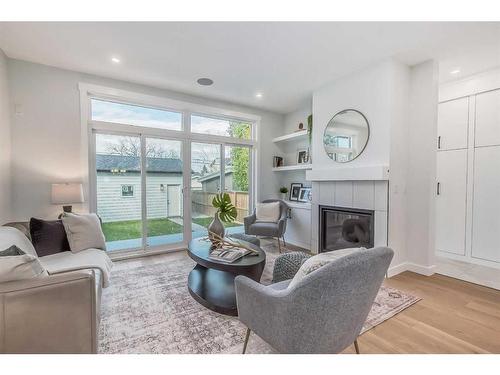4916 22 Street Sw, Calgary, AB - Indoor Photo Showing Living Room With Fireplace