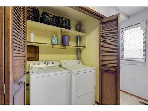 450 Muskrat Street, Banff, AB - Indoor Photo Showing Laundry Room