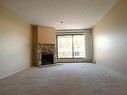 135-10120 Brookpark Boulevard Sw, Calgary, AB  - Indoor With Fireplace 