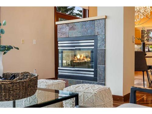 192 Slopeview Drive Sw, Calgary, AB - Indoor With Fireplace
