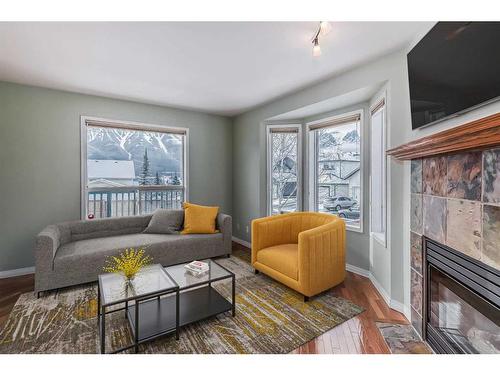 1 Grotto Place, Canmore, AB - Indoor Photo Showing Living Room With Fireplace