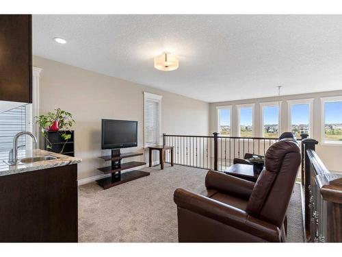 148 Marquis View Se, Calgary, AB - Indoor Photo Showing Living Room