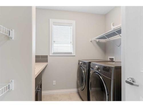 148 Marquis View Se, Calgary, AB - Indoor Photo Showing Laundry Room