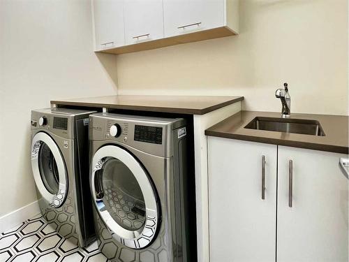 113 Aspen Meadows Hill Sw, Calgary, AB - Indoor Photo Showing Laundry Room