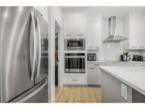 628 Livingston Way Ne, Calgary, AB - Indoor Photo Showing Kitchen With Upgraded Kitchen