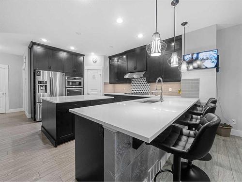 441 Kinniburgh Cove, Chestermere, AB - Indoor Photo Showing Kitchen With Upgraded Kitchen