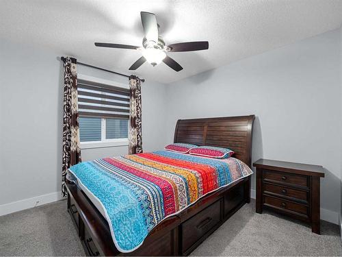441 Kinniburgh Cove, Chestermere, AB - Indoor Photo Showing Bedroom