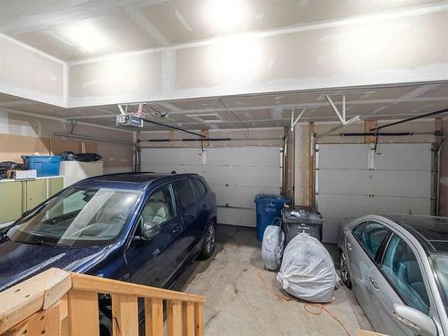 441 Kinniburgh Cove, Chestermere, AB - Indoor Photo Showing Garage