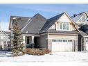 1025 Coopers Drive Sw, Airdrie, AB  - Outdoor With Facade 