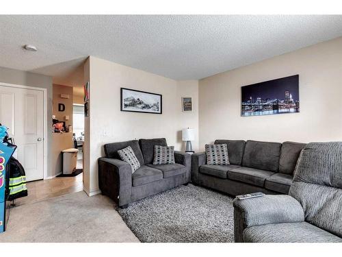 241 Saddlebrook Point Ne, Calgary, AB - Indoor Photo Showing Living Room