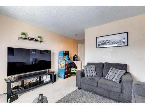 241 Saddlebrook Point Ne, Calgary, AB - Indoor Photo Showing Living Room