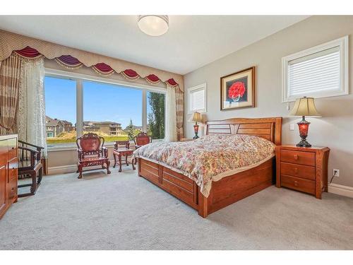 42 Waters Edge Drive, Heritage Pointe, AB - Indoor Photo Showing Bedroom