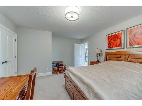 42 Waters Edge Drive, Heritage Pointe, AB - Indoor Photo Showing Bedroom