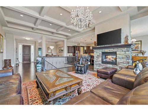 42 Waters Edge Drive, Heritage Pointe, AB - Indoor Photo Showing Living Room With Fireplace