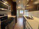 33-1230 Cameron Avenue Sw, Calgary, AB  - Indoor Photo Showing Kitchen With Double Sink 